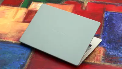 ASUS has turned its excellent ZenBook 14 into another MacBook Neo competitor with Snapdragon X, and its OLED display is icing on the cake